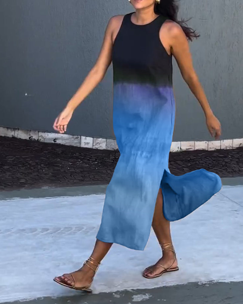 Mouwloze jurk met zijsplit in de kleur Grijs voor dames in stijl ideaal voor de lente.