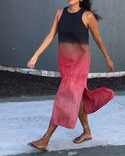 Mouwloze jurk met zijsplit in de kleur Grijs voor dames in stijl ideaal voor de lente.