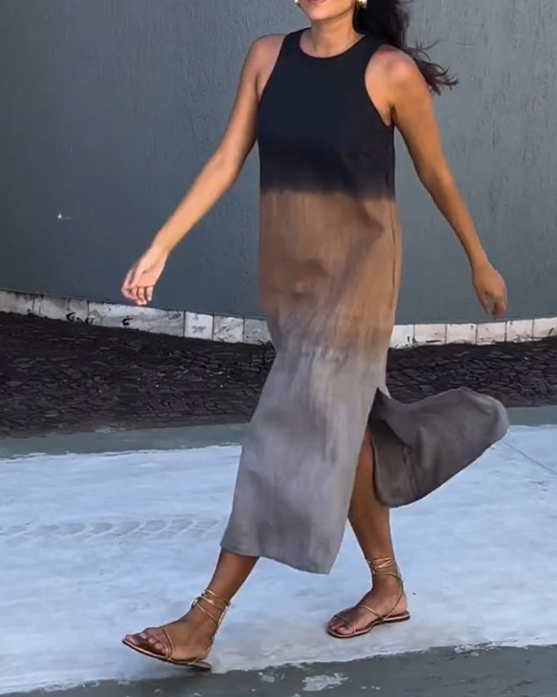 Mouwloze jurk met zijsplit in de kleur Grijs voor dames in stijl ideaal voor de lente.