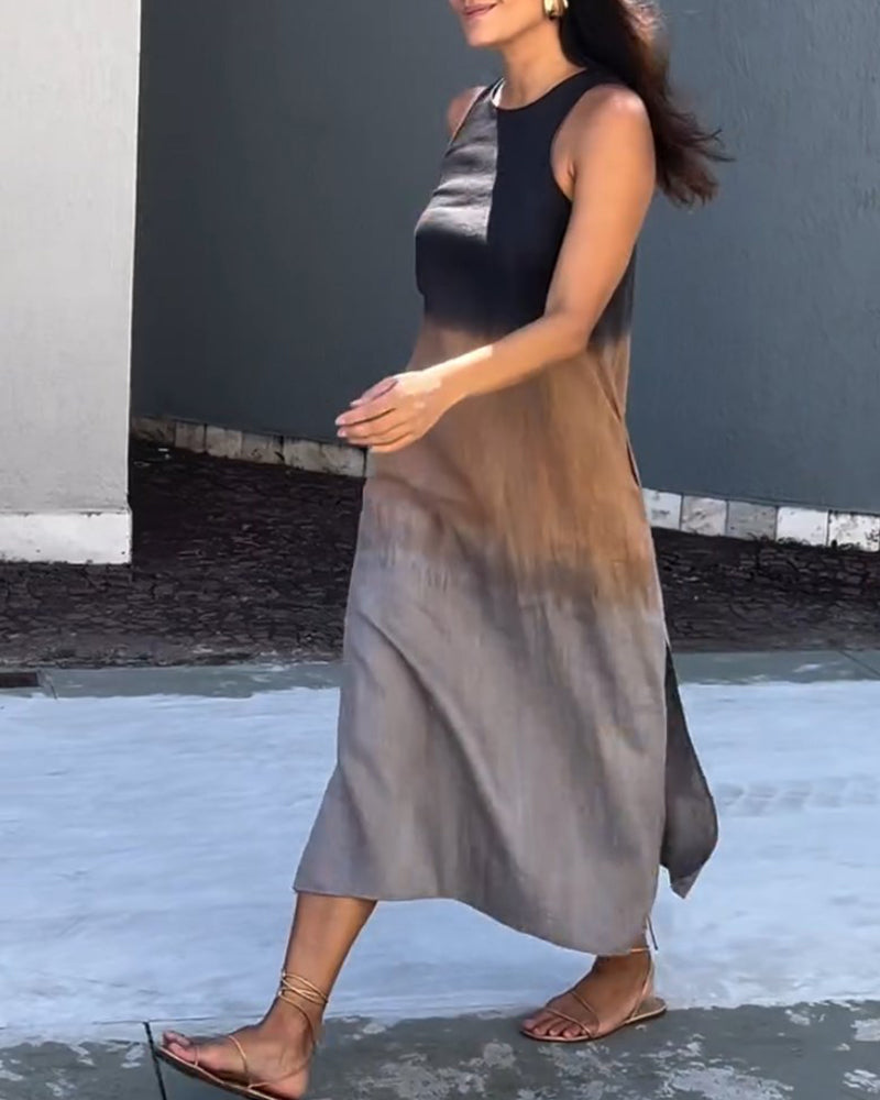 Mouwloze jurk met zijsplit in de kleur Grijs voor dames in stijl ideaal voor de lente.