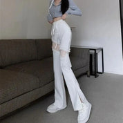 Natalia | Stijlvolle Punk Uitlopende Broek met Kant in de kleur Wit voor dames in Streetwear stijl ideaal voor de lente.