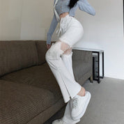 Natalia | Stijlvolle Punk Uitlopende Broek met Kant in de kleur Wit voor dames in Streetwear stijl ideaal voor de lente.