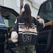Nienke | Geweldige racejas met badges en emblemen in de kleur Zwart voor dames in stijl ideaal voor de herfst.