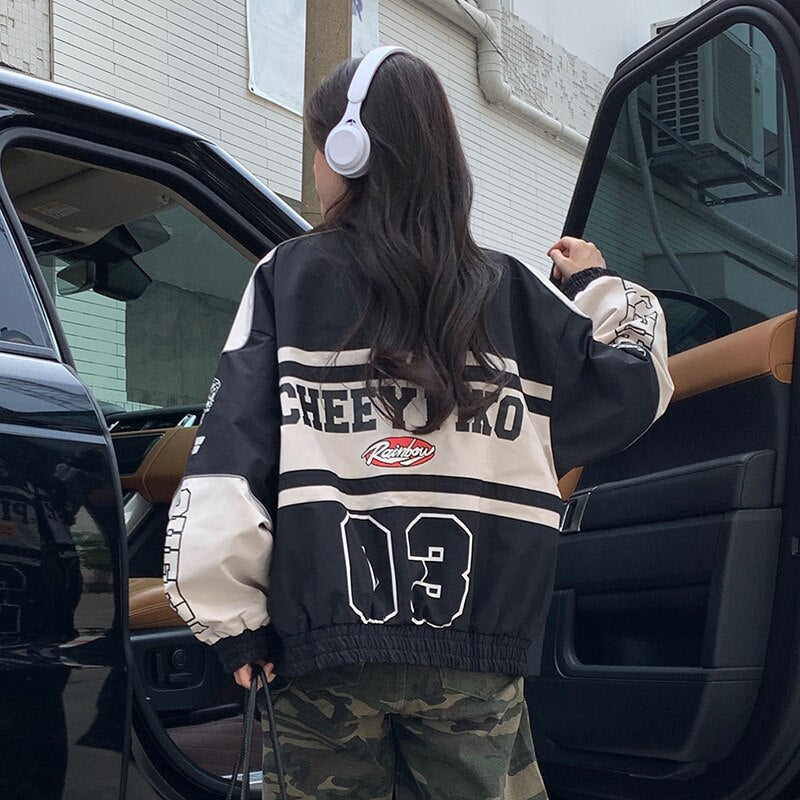 Nienke | Geweldige racejas met badges en emblemen in de kleur Zwart voor dames in stijl ideaal voor de herfst.