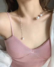 Nina | Claviculeketting met nep parel in de kleur Goud voor dames in stijl geschikt voor alle seizoenen.