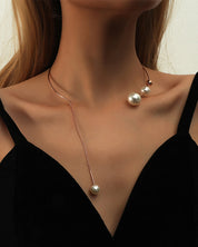 Nina | Claviculeketting met nep parel in de kleur Goud voor dames in stijl geschikt voor alle seizoenen.