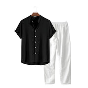 Philip | Linnen set met polo en broek in de kleur Zwart/Beige voor heren in Beach stijl ideaal voor de zomer.