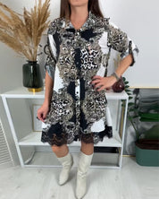 Retro jurk van patchworkkant in de kleur Zwart voor dames in stijl ideaal voor de herfst.