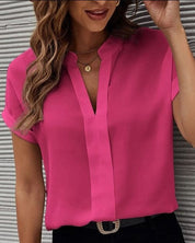 Deze stijlvolle blouse is een ideale toevoeging aan je garderobe, met korte mouwen en een trendy V-hals. Gemaakt van chiffon en geschikt voor dagelijks gebruik in diverse seizoenen.