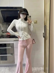 Rosa | Flared broek met hoge taille in de kleur Roze voor dames in stijl geschikt voor alle seizoenen.