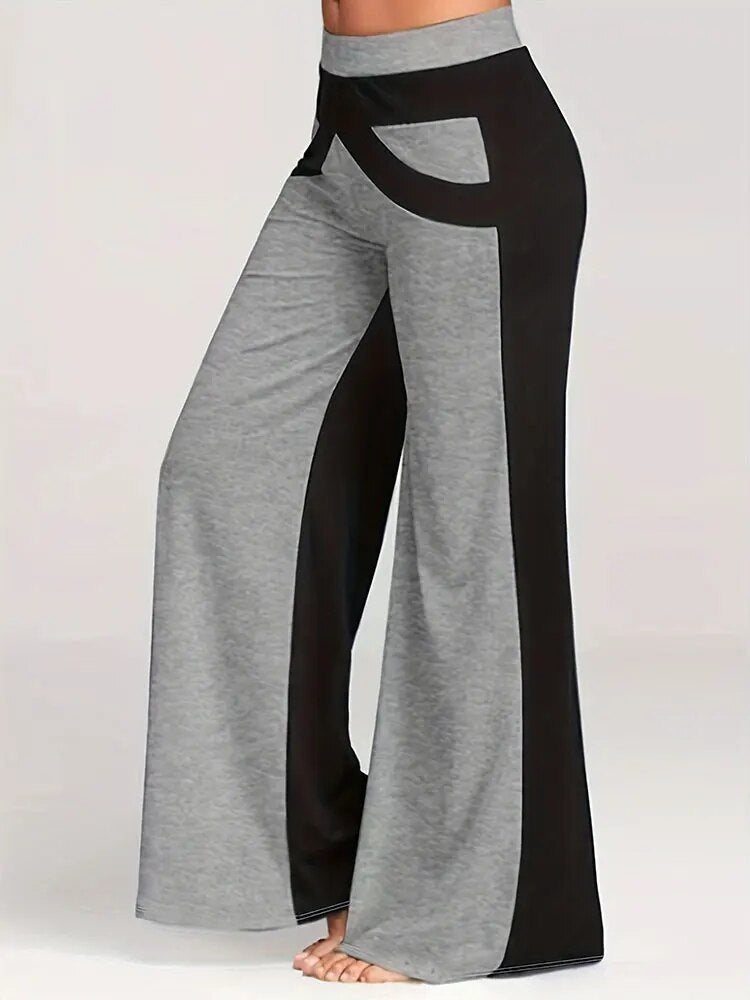 Sidney | Flared broek voor grote maten in de kleur Grijs voor dames in stijl ideaal voor de lente.