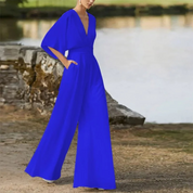 Sofie | Dames jumpsuit met V-hals en wijde pijpen in de kleur Blauw voor dames in Party stijl ideaal voor de herfst.