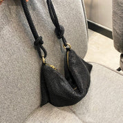 Sylvie Bag | Unieke tas om je outfit een upgrade te geven in de kleur Zilver voor dames in stijl geschikt voor alle seizoenen.