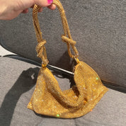 Sylvie Bag | Unieke tas om je outfit een upgrade te geven in de kleur Goud voor dames in stijl geschikt voor alle seizoenen.