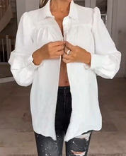 Witte blouse met pofmouwen in de kleur Wit voor dames in stijl ideaal voor de herfst.