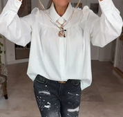 Witte blouse met pofmouwen in de kleur Wit voor dames in stijl ideaal voor de herfst.