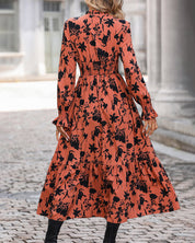 A-lijnjurk met print en V-hals in de kleur Oranje voor dames in stijl ideaal voor de herfst.