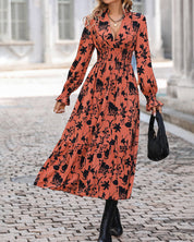 A-lijnjurk met print en V-hals in de kleur Oranje voor dames in stijl ideaal voor de herfst.