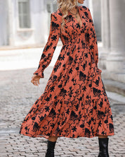 A-lijnjurk met print en V-hals in de kleur Oranje voor dames in stijl ideaal voor de herfst.