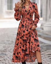 A-lijnjurk met print en V-hals in de kleur Oranje voor dames in stijl ideaal voor de herfst.