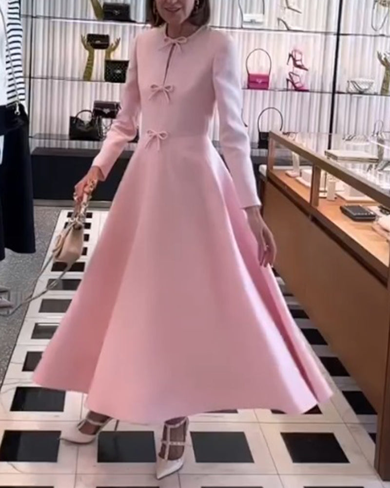 Arial | Effen kleur elegante jurk met strikken in de kleur Roze voor dames in stijl ideaal voor de herfst.