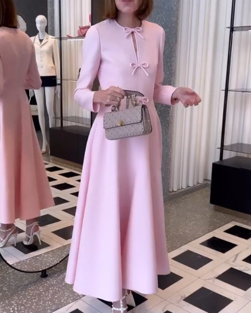 Arial | Effen kleur elegante jurk met strikken in de kleur Roze voor dames in stijl ideaal voor de herfst.