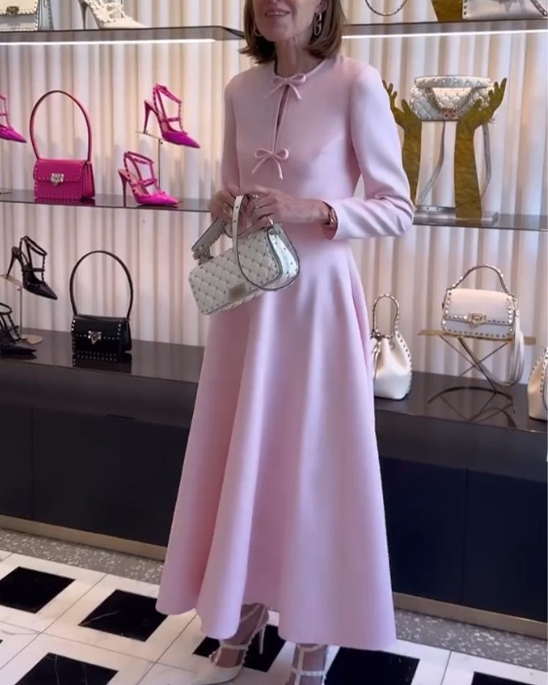 Arial | Effen kleur elegante jurk met strikken in de kleur Roze voor dames in stijl ideaal voor de herfst.