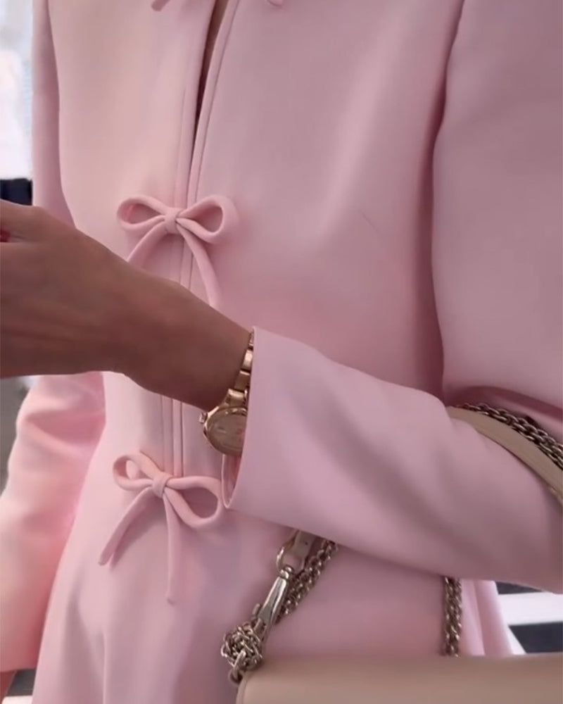 Arial | Effen kleur elegante jurk met strikken in de kleur Roze voor dames in stijl ideaal voor de herfst.