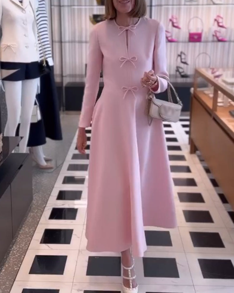 Arial | Effen kleur elegante jurk met strikken in de kleur Roze voor dames in stijl ideaal voor de herfst.