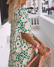 Bedrukte Jurk V-hals Magreet in de kleur Groen voor dames in stijl ideaal voor de herfst.