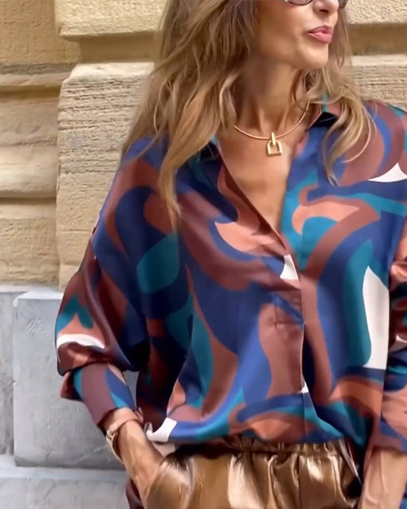 Blouse in retrostijl met een V-hals en lange mouwen in de kleur Blauw voor dames in stijl ideaal voor de herfst.