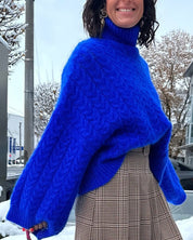 Casual effen gekleurde coltrui in de kleur Blauw voor dames in stijl ideaal voor de herfst.