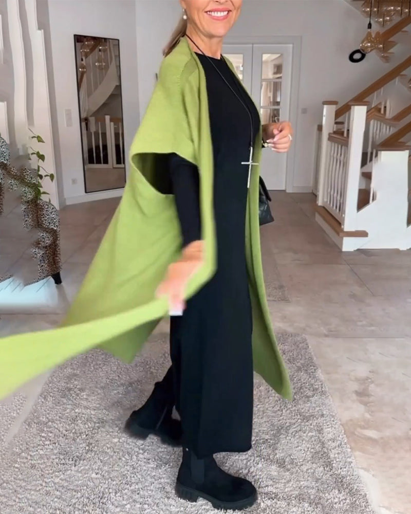 Effen lange jurk met ronde hals in de kleur Zwart voor dames in stijl ideaal voor de herfst.