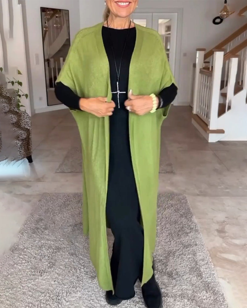 Effen lange jurk met ronde hals in de kleur Zwart voor dames in stijl ideaal voor de herfst.