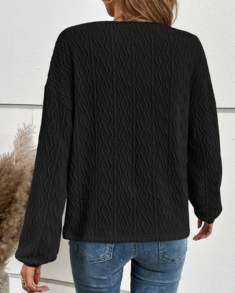 Effen topje met knopen in de kleur Grijs voor dames in stijl ideaal voor de herfst.