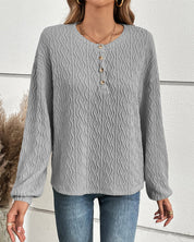 Effen topje met knopen in de kleur Grijs voor dames in stijl ideaal voor de herfst.