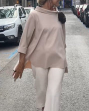 Elegante blouse met een onregelmatige snit en lange mouwen in de kleur Grijs voor in stijl ideaal voor de herfst.