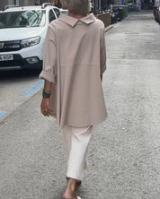 Elegante blouse met een onregelmatige snit en lange mouwen in de kleur Grijs voor in stijl ideaal voor de herfst.