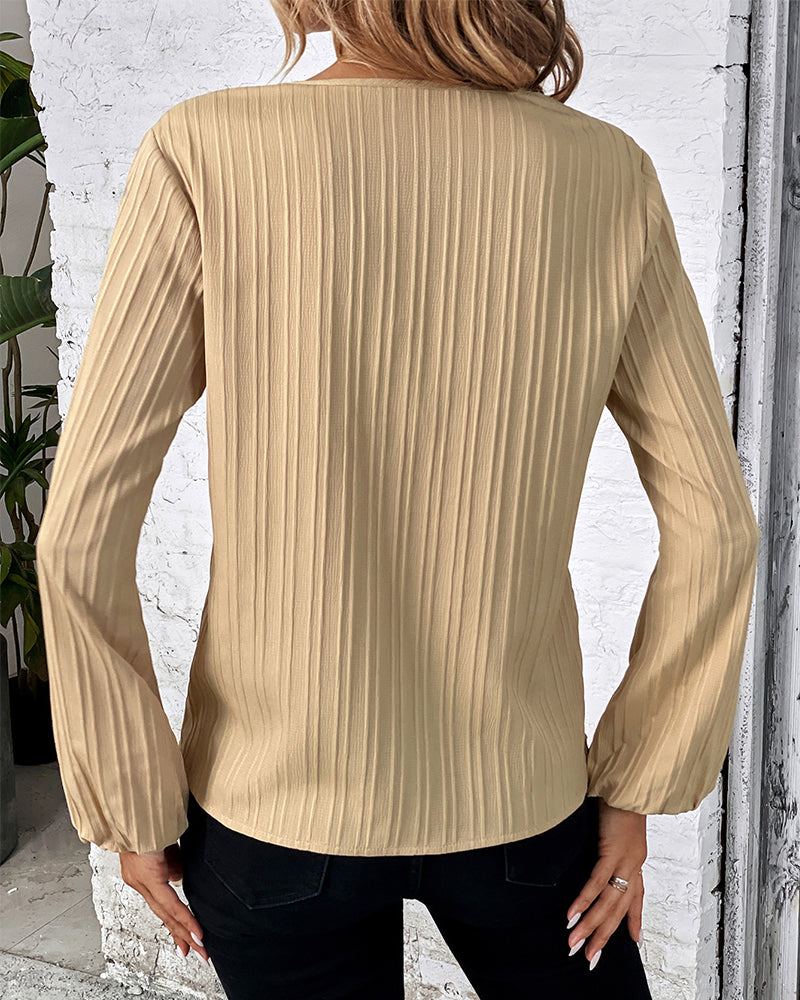 Elegante top met lange mouwen in de kleur Goud voor dames in stijl ideaal voor de herfst.