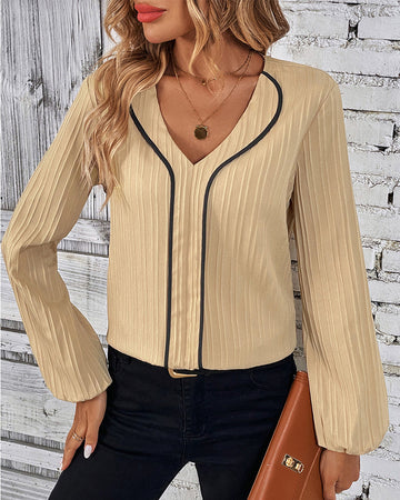 Elegante top met lange mouwen in de kleur Goud voor dames in stijl ideaal voor de herfst.