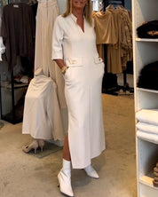 Els | Eénkleurige jurk met 3/4 mouwsplit in de kleur Wit voor dames in stijl ideaal voor de herfst.