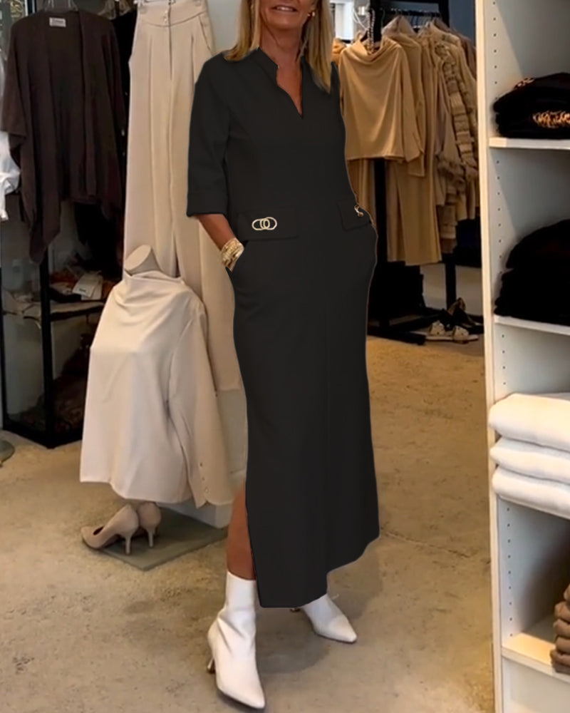 Els | Eénkleurige jurk met 3/4 mouwsplit in de kleur Zwart voor dames in stijl ideaal voor de herfst.
