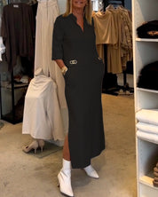 Els | Eénkleurige jurk met 3/4 mouwsplit in de kleur Zwart voor dames in stijl ideaal voor de herfst.