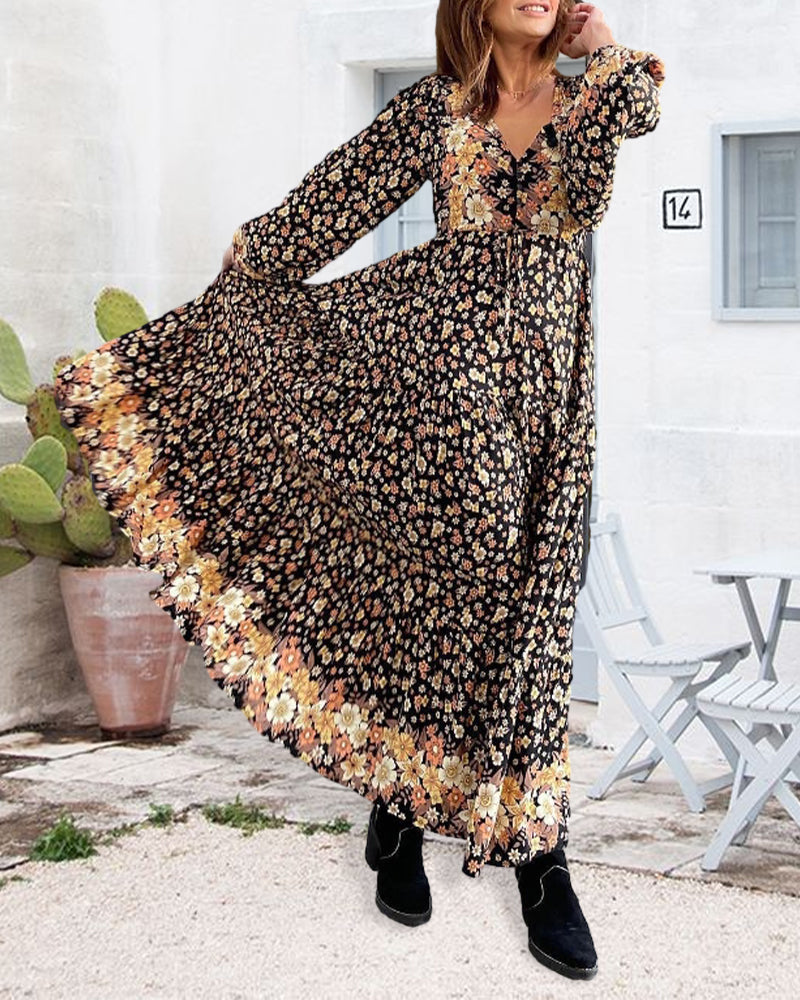 Gebloemd herfstjurkje met V-hals in de kleur Zwart voor dames in stijl ideaal voor de herfst.