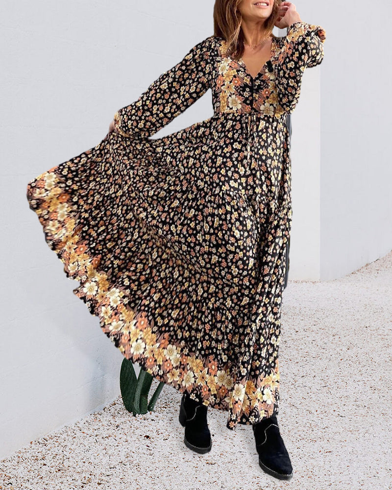 Gebloemd herfstjurkje met V-hals in de kleur Zwart voor dames in stijl ideaal voor de herfst.