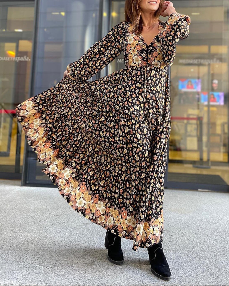 Gebloemd herfstjurkje met V-hals in de kleur Zwart voor dames in stijl ideaal voor de herfst.