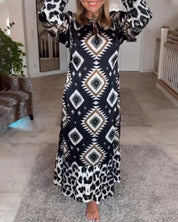 Jurk met lange mouwen en geometrische print in de kleur Zwart voor dames in stijl ideaal voor de herfst.
