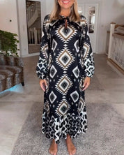Jurk met lange mouwen en geometrische print in de kleur Zwart voor dames in stijl ideaal voor de herfst.