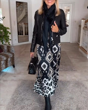 Jurk met lange mouwen en geometrische print in de kleur Zwart voor dames in stijl ideaal voor de herfst.