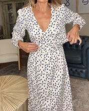 Jurk met print en V-hals in de kleur Grijs voor dames in stijl ideaal voor de herfst.